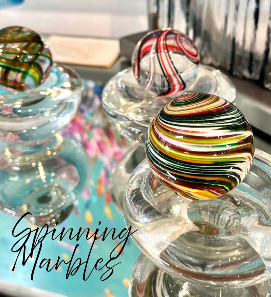 Spinning Marbles by Little River