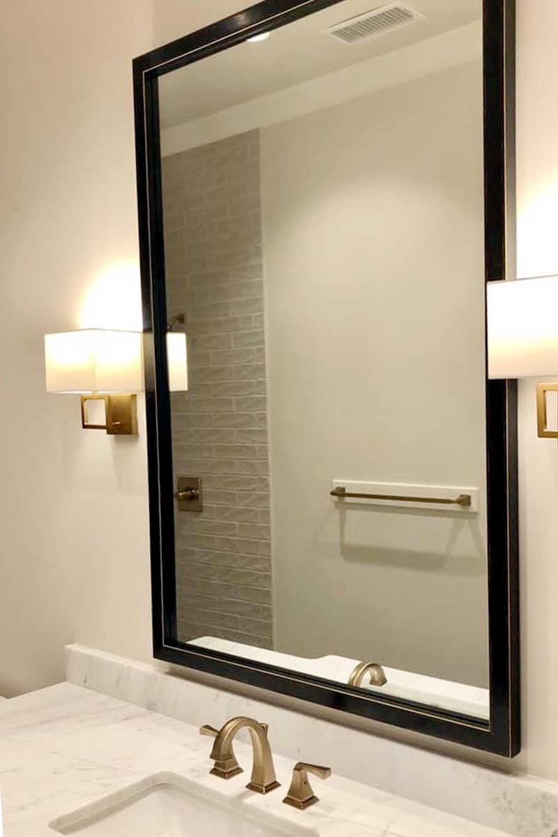 custom mirrors like this can enhance a bathroom